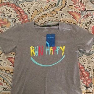 Women’s medium Brooks distance short sleeve.